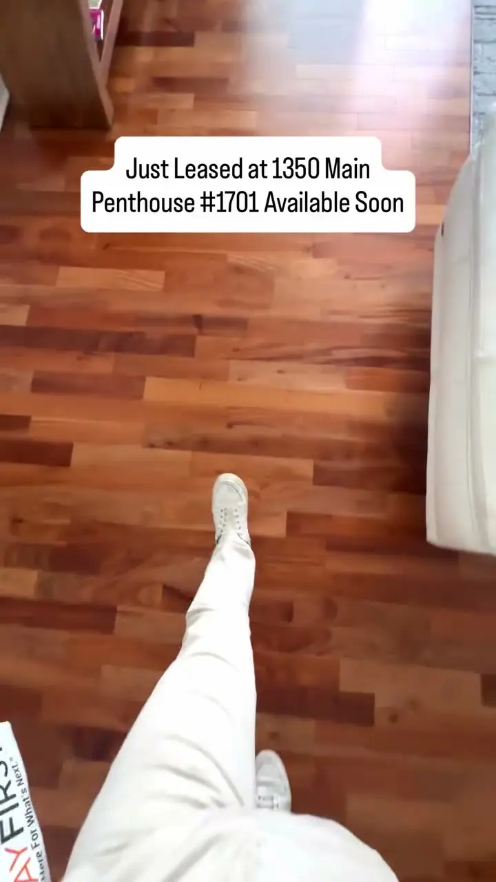 Hardwood floor in a condo with a Just Leased at 1350 Main label