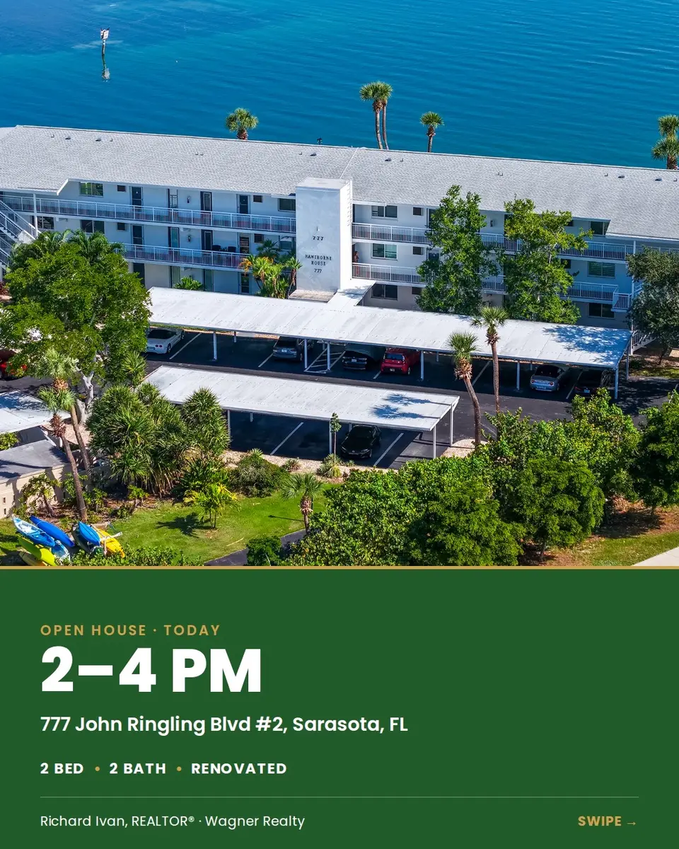 Aerial of a bayfront condo complex with an Open House graphic