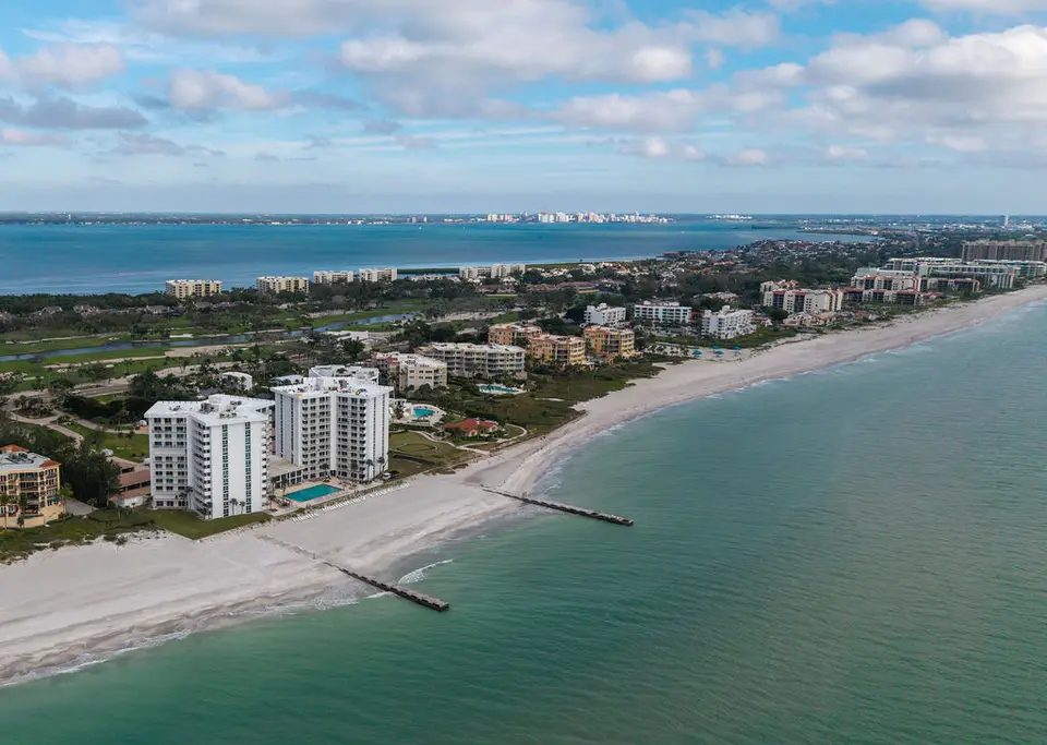 Aerial view of Longboat Key beachfront towers along the Gulf coastline