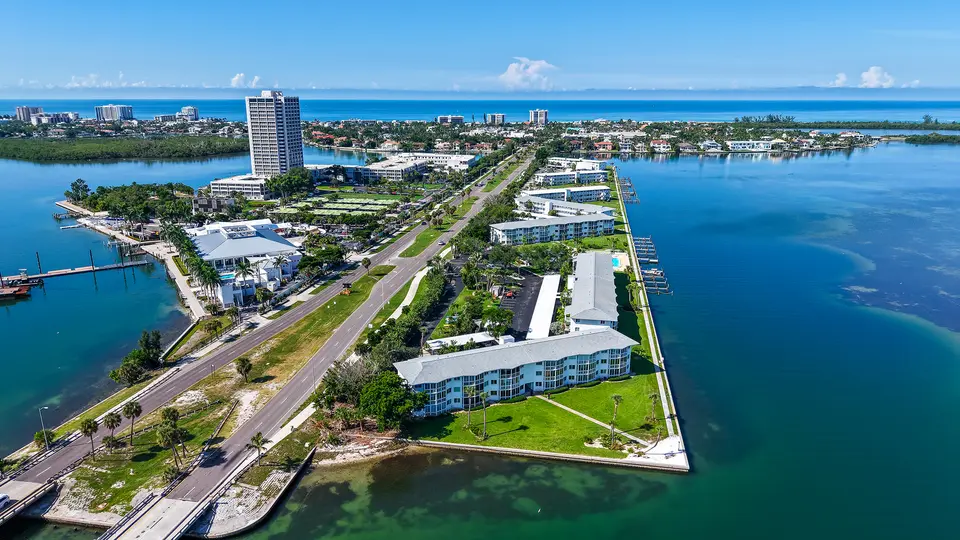 Aerial view over the bay toward Lido Key and St. Armands with the causeway and turquoise water